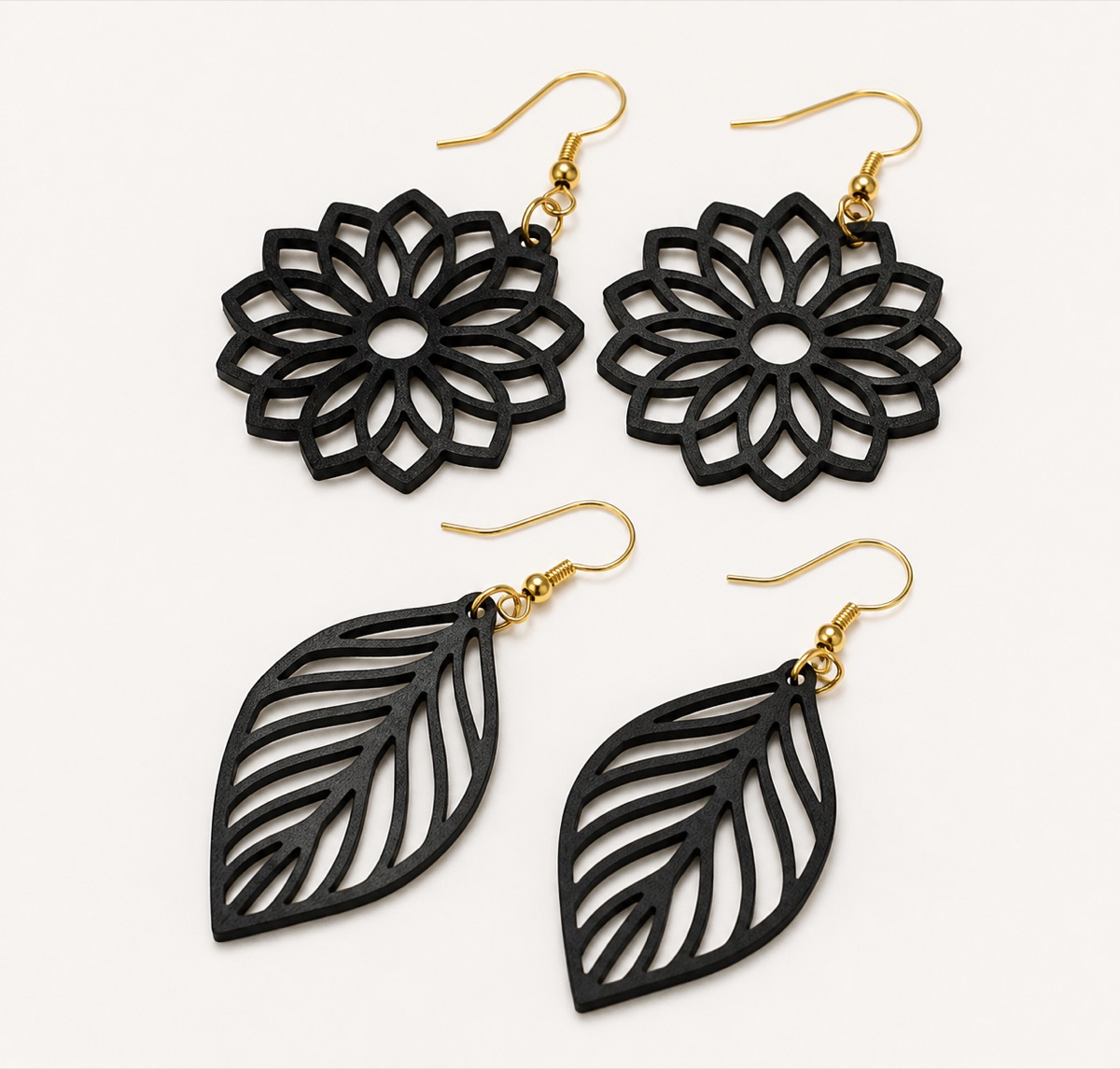 3D printed black flower and leaf earrings