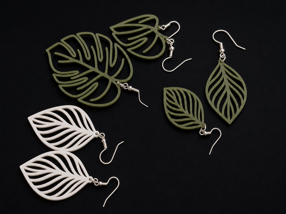 3D printed leaf earrings in green and white